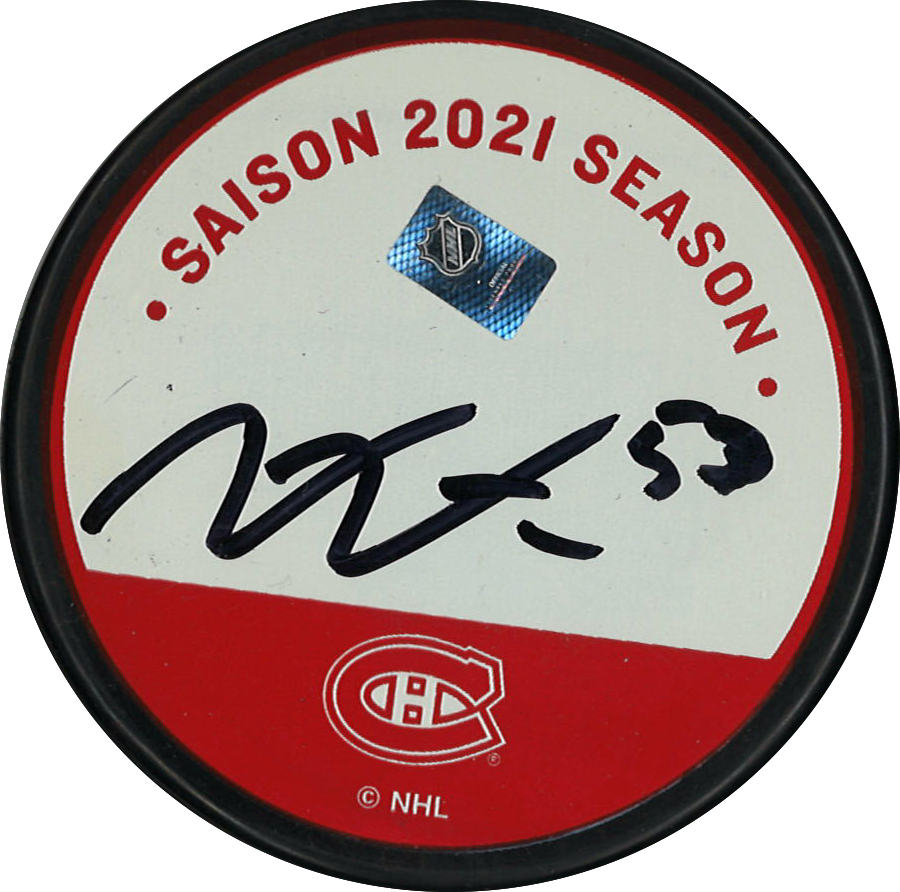 Victor Mete rondelle autographiée de la Fondation des Canadiens pour l'Enfance