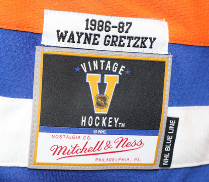 Wayne Gretzky gilet des Oilers d'Edmonton 86-87 Mitchell & Ness autographié et certifié de Upper Deck Authenticated