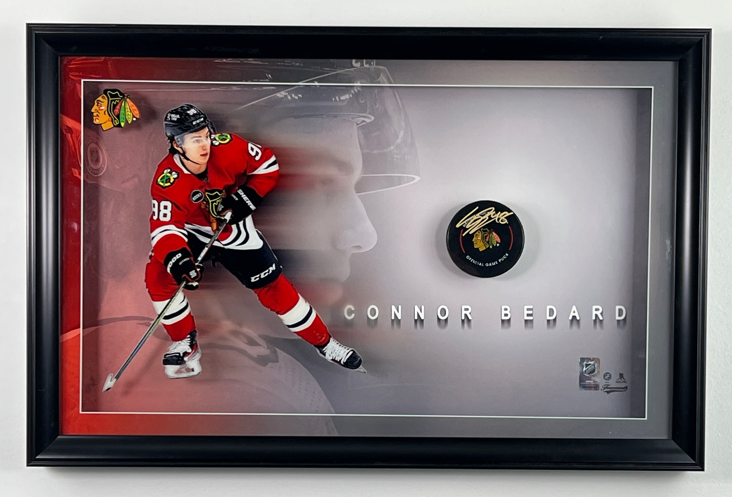Connor Bedard frame with autographed Chicago Blackhawks puck