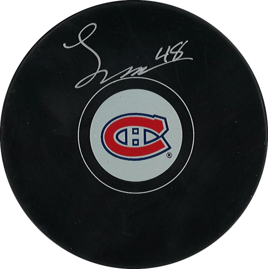 Lane Hutson Autographed Puck from the Montreal Canadiens