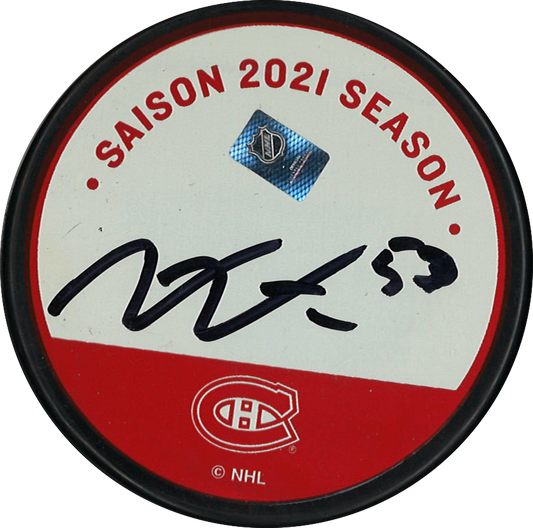 Victor Mete rondelle autographiée de la Fondation des Canadiens pour l'Enfance